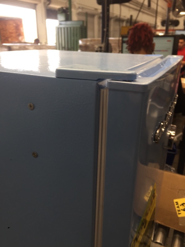 Photo 4 of ***PARTS ONLY*** DAMAGED
Frigidaire EFR376-BLUE 3.2 Cu Ft Blue Retro Bar Fridge with Side Bottle Opener
