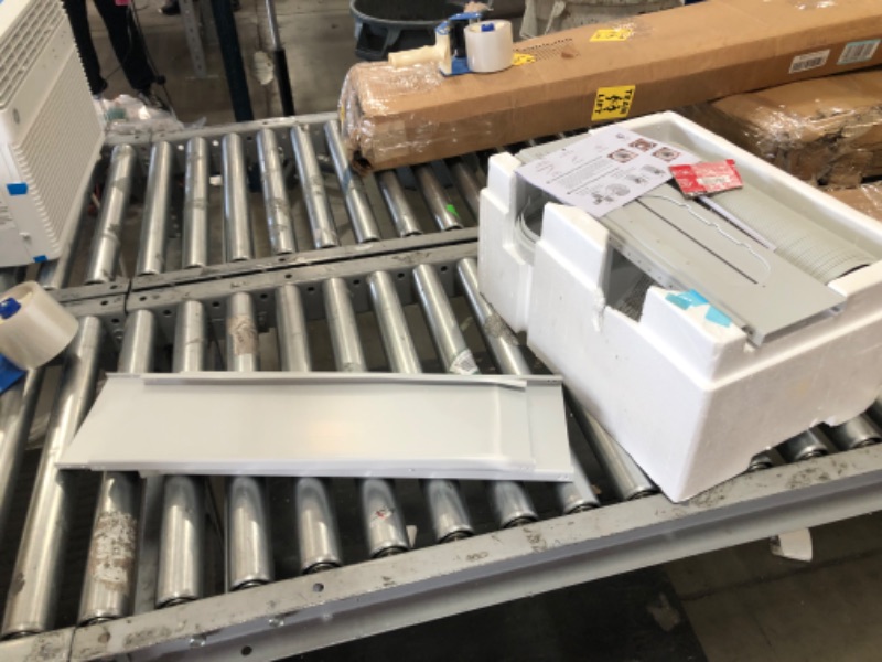 Photo 1 of LG 6,000 BTU (DOE) / 8,000 BTU (ASHRAE) Portable Air Conditioner, Cools 250 Sq.Ft. (10' x 25' room size), Quiet Operation, LCD Remote, Window Installation Kit Included, 115V
