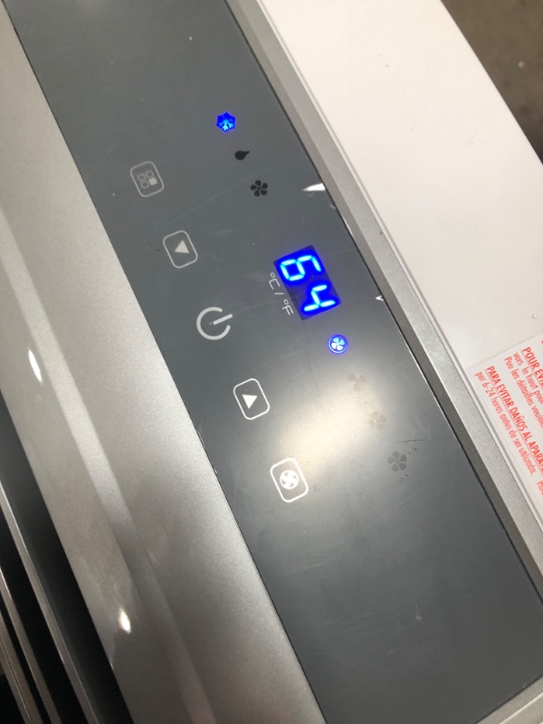 Photo 1 of BLACK+DECKER 8,000 BTU DOE (14,000 BTU ASHRAE) Portable Air Conditioner with Remote Control, White