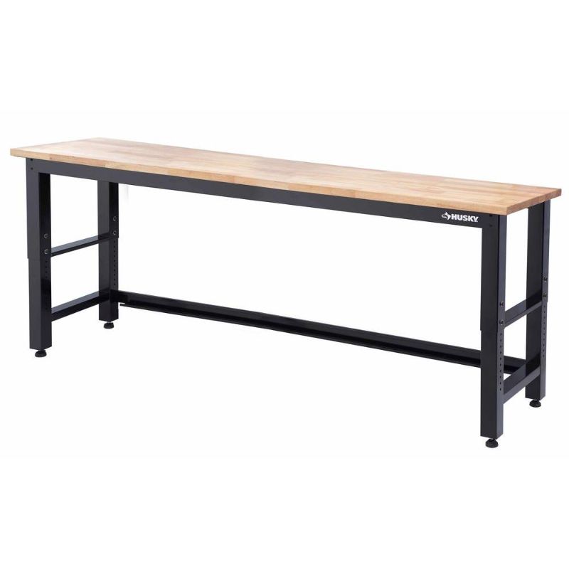 Photo 1 of **MINOR DAMAGE FROM SHIPPING** Husky 8 Ft. Adjustable Height Solid Wood Top Workbench in Black for Ready-to-Assemble Steel Garage Storage System
