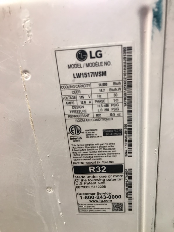 Photo 2 of **MINOR DAMAGE*MISSING PARTS* LG Electronics
14,000 BTU 115-V Dual Inverter Smart Window Air Conditioner LW1517IVSM with WiFi and Remote in White