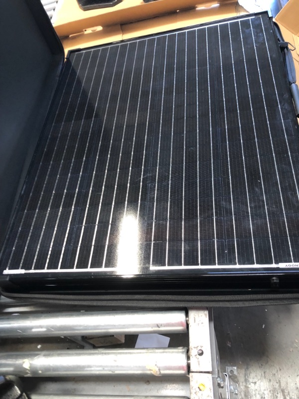 Photo 5 of ***MINOR WARE TO UNIT** 
Renogy
200-Watt 12-Volt Monocrystalline Foldable Suitcase Off-Grid Solar Power Kit with Voyager