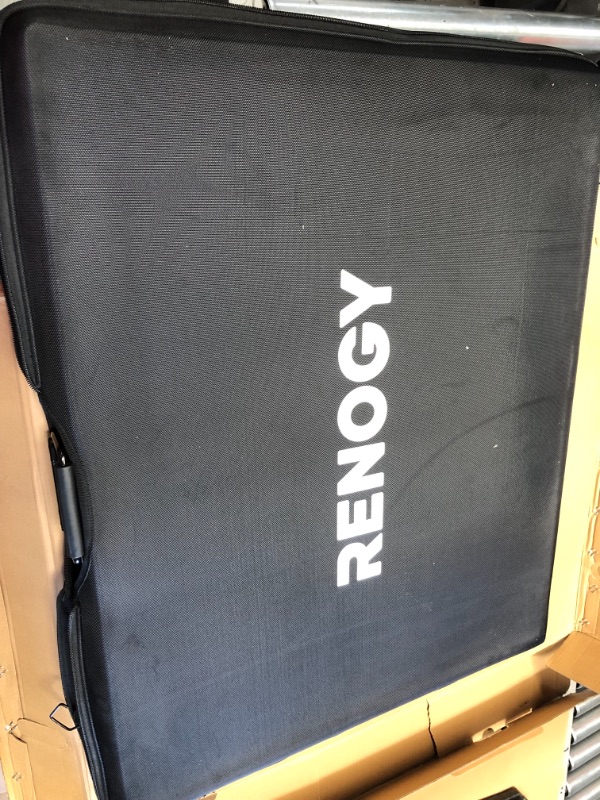 Photo 1 of ***MINOR WARE TO UNIT** 
Renogy
200-Watt 12-Volt Monocrystalline Foldable Suitcase Off-Grid Solar Power Kit with Voyager