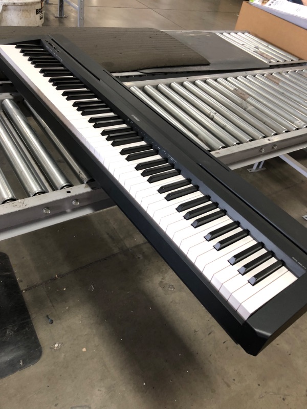 Photo 1 of YAMAHA P71 88-Key Weighted Action Digital Piano with Sustain Pedal and Power Supply (Amazon-Exclusive)
