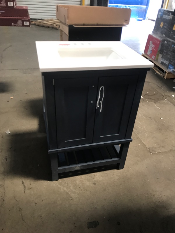 Photo 1 of (STOCK PIC INACCURATELY REFLECTS ACTUAL PRODUCT) single sink blue vanity with white sink bottom shelf without handle