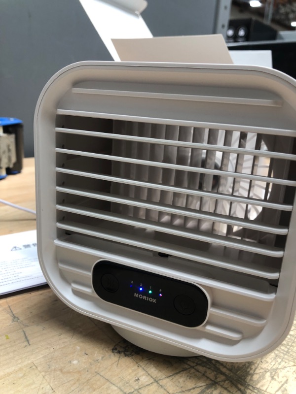 Photo 2 of MORIOX Portable Air Cooler Evaporative Air Conditioner with Rechargerable Battery 3 Speed Fan with Atomizing Humidifier for Personal Desktop
