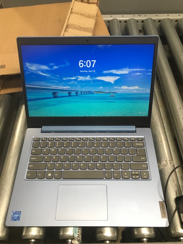 Photo 1 of Lenovo IdeaPad 1 Laptop, 14.0" HD Display, Intel Celeron N4020, 4GB RAM, 64GB Storage, Intel UHD Graphics 600, Windows 11 in S Mode, Ice Blue