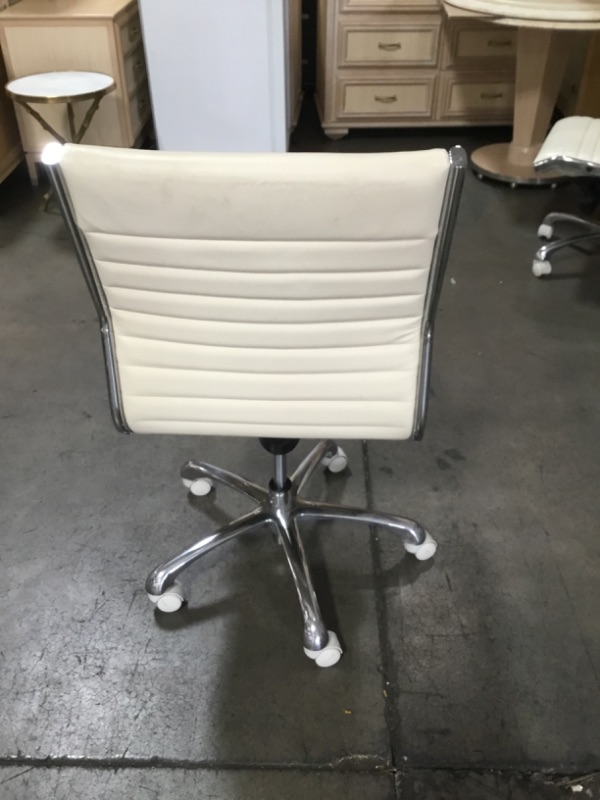 Photo 4 of NON REFUNDABLE  SOLD AS IS  CREME FAUX LEATHER OFFICE CHAIR 36H X 20W INCHES FAUX 
