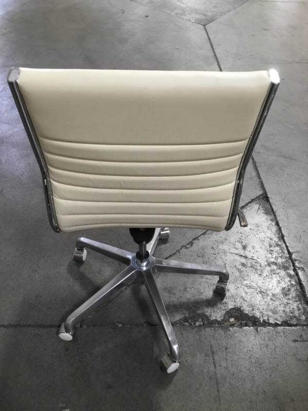 Photo 4 of NON REFUNDABLE  SOLD AS IS  CREME FAUX LEATHER OFFICE CHAIR 36H X 20W INCHES FAUX 
