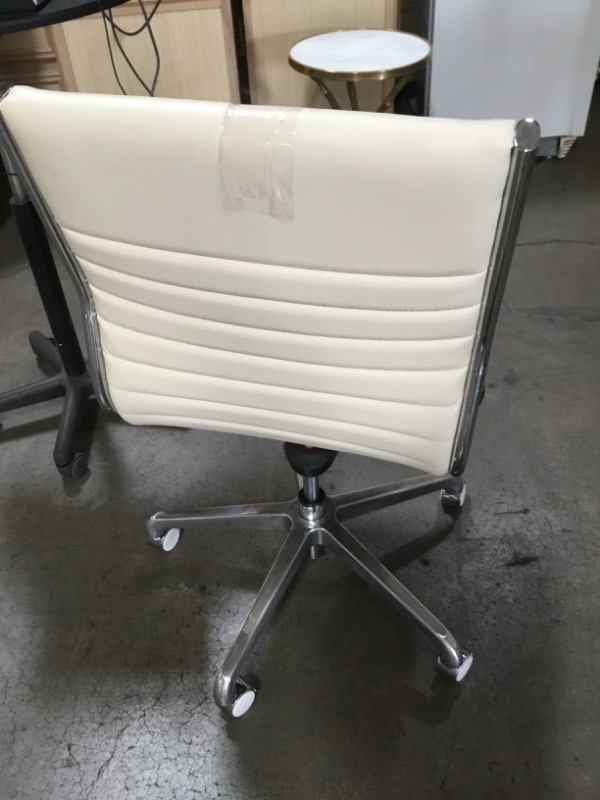 Photo 4 of NON REFUNDABLE  SOLD AS IS  CREME FAUX LEATHER OFFICE CHAIR 36H X 20W INCHES FAUX 
