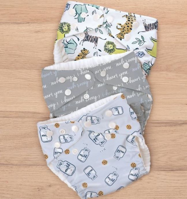 Photo 1 of Pampers Pure Hybrid Reusable Cloth Diaper Covers - (Jungle, I Heart You-gray, Milk and Cookies -Pattern and 3 Count) size 1 

