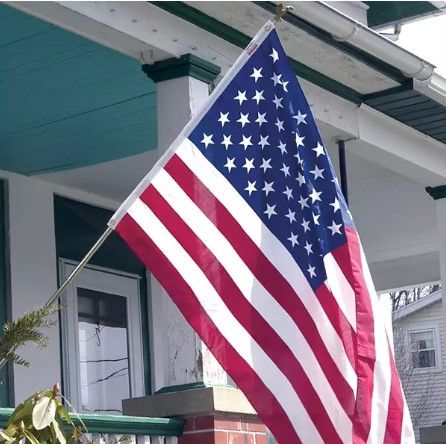 Photo 1 of (TORN) American Flag (57" x 34") with Metal Pole 6' and Plastic Bronze Eagle