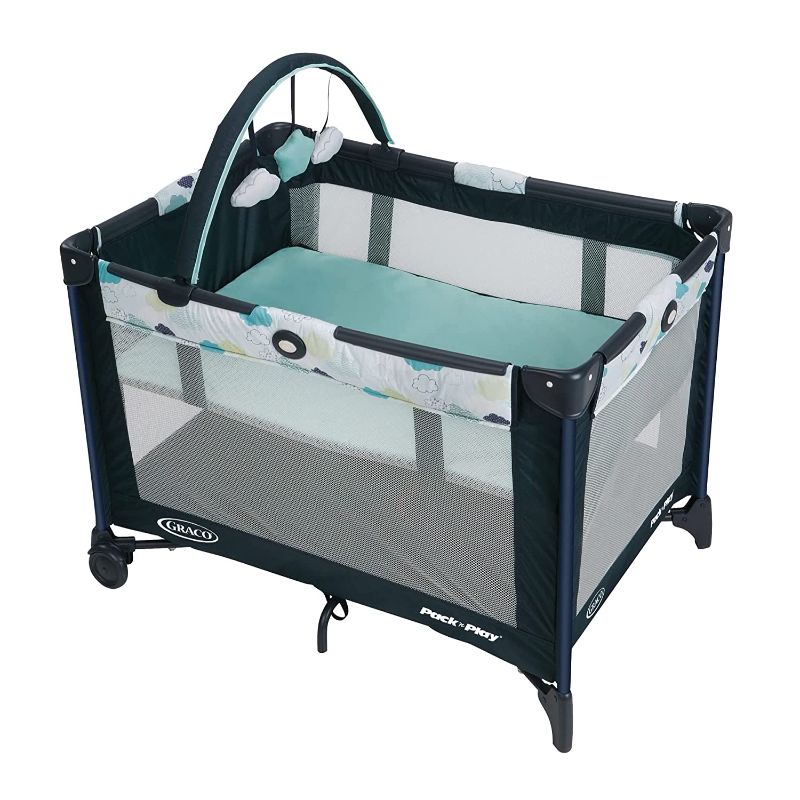 Photo 1 of ***Mesh damaged, Missing bag carrier***
Graco Pack and Play On the Go Playard | Includes Full-Size Infant Bassinet, Push Button Compact Fold, Stratus , 39.5x28.25x29 Inch (Pack of 1)
