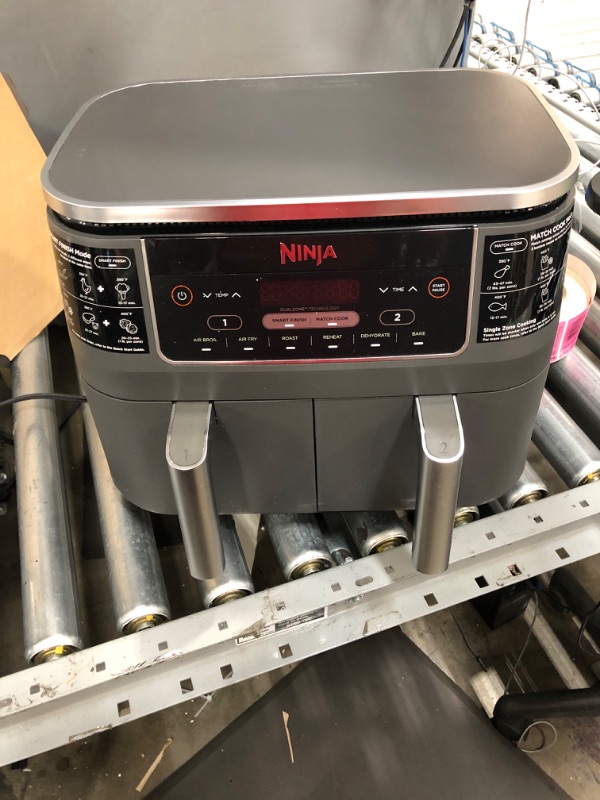 Photo 2 of Ninja DZ201 Foodi 8 Quart 6-in-1 DualZone 2-Basket Air Fryer with 2 Independent Frying Baskets, Match Cook & Smart Finish to Roast, Broil, Dehydrate & More for Quick, Easy Meals, Grey
