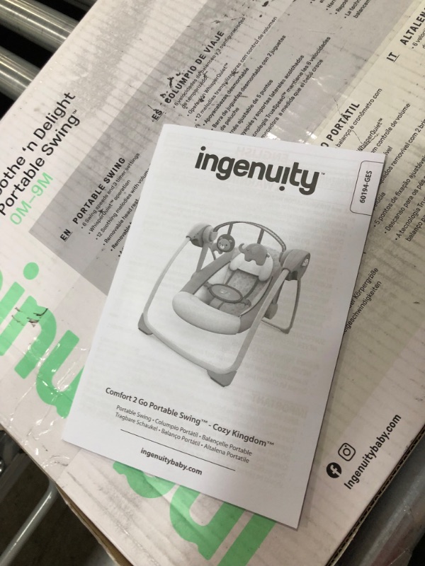 Photo 1 of Ingenuity Soothe 'n Delight 6-Speed Compact Portable Baby Swing with Music and Toy Bar, Folds for Easy Travel - Cozy Kingdom
