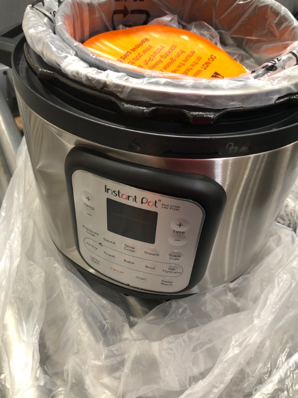 Photo 2 of ***DAMAGED***
Instant Pot Duo Crisp 11-in-1 Air Fryer and Electric Pressure Cooker Combo with Multicooker Lids that Air Fries, Steams, Slow Cooks, Sautés, Dehydrates and More, Free App With 1900 Recipes, 8 Quart
