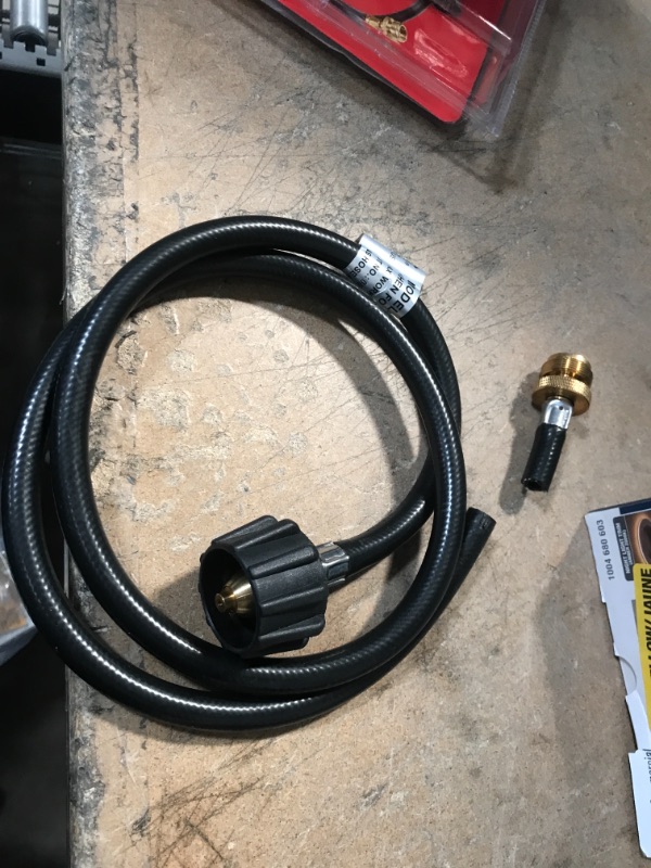 Photo 2 of **DAMAGED**
4 ft. Hose with Adaptor
