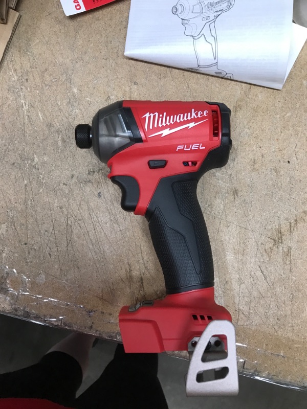 Photo 3 of Milwaukee
M18 FUEL SURGE 18-Volt Lithium-Ion Brushless Cordless 1/4 in. Hex Impact Driver (Tool-Only)