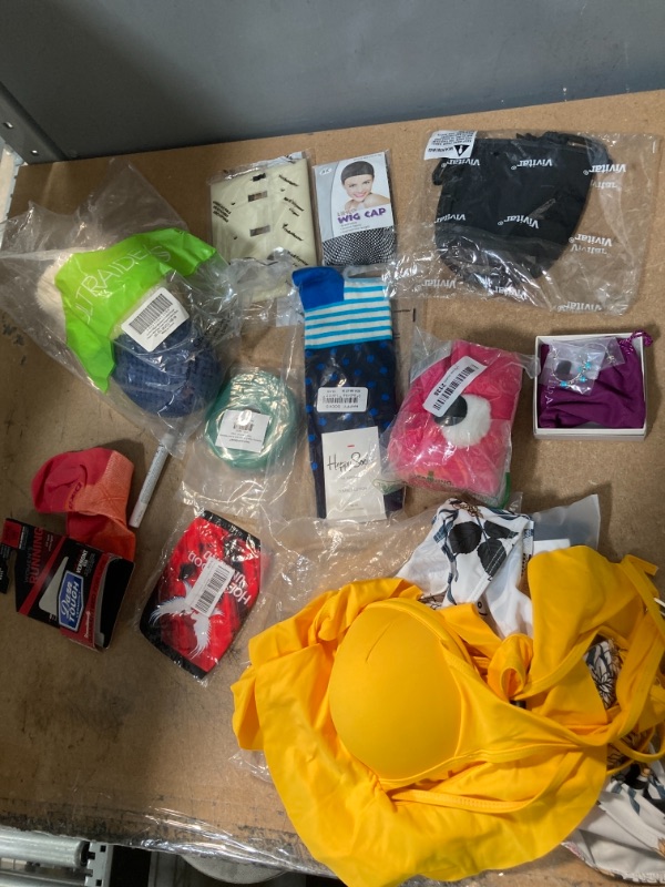 Photo 1 of **NON-REFUNDABLE** Assorted Home Good Items and Clothing; Bras, Shirt dress, Masks, Wig Caps, Socks, , Tape, Flat Socks. Plush Toy, Earings and Pouch. Sizes: M, 10-15, W7.5-9.5, 7-8