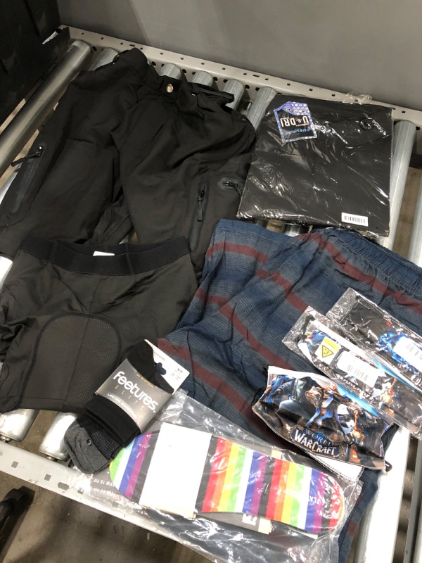 Photo 1 of **NON REFUNDABLE** SOLD AS IS
Bundle of MENS clothes and accessories (shorts, bike shorts, socks, face masks, pj pants, shirt)
sizes vary from: medium to XL