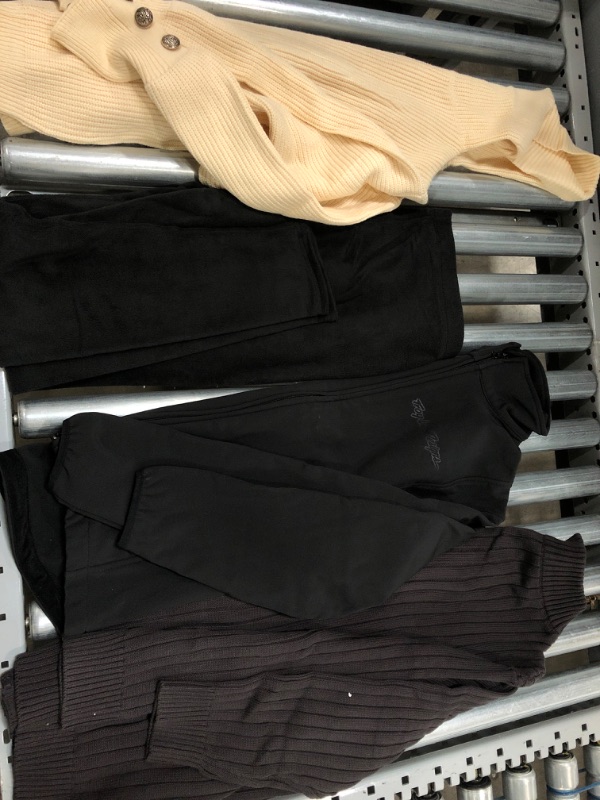 Photo 1 of ***NON REFUNDABLE***  SOLD AS IS 
bundle of womens winter clothes (Beige and Brown sweaters, Black jacket , black pants)
sizez vary from: Small to XL