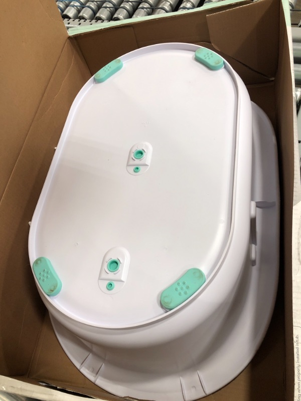 Photo 2 of Fridababy 4-in-1 Grow-with-Me Bath Tub in White
