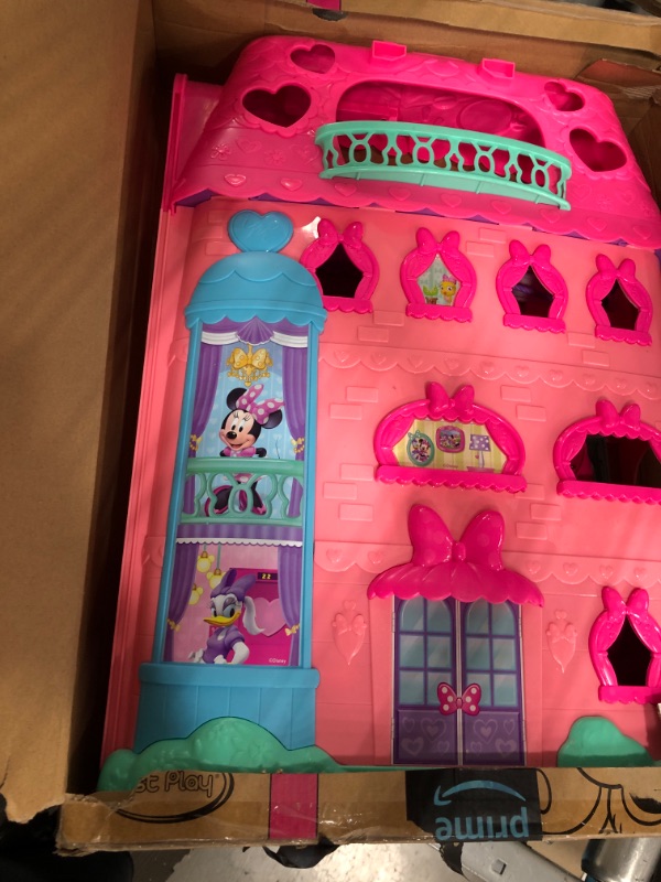 Photo 2 of Minnie Mouse Bow-Tel Hotel, 2-Sided Playset with Lights, Sounds, and Elevator, 20 Pieces, Includes Minnie Mouse, Daisy Duck, and Snowpuff Figures, by
