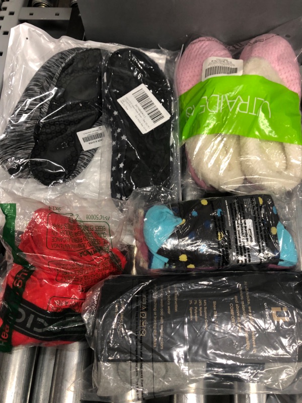 Photo 1 of bundle of assorted brand and sizes for men and women socks and slippers
not returnable