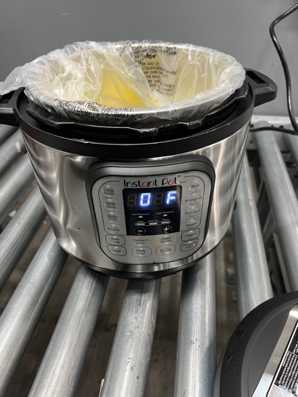 Photo 3 of Instant Pot Duo 7-in-1 Electric Pressure Cooker, Slow Cooker, Rice Cooker, Steamer, Sauté, Yogurt Maker, Warmer & Sterilizer, 6 Quart, Stainless Steel/Black
MINOR DAMAGE TO THE LID ISNT CONNECTED ANYMORE