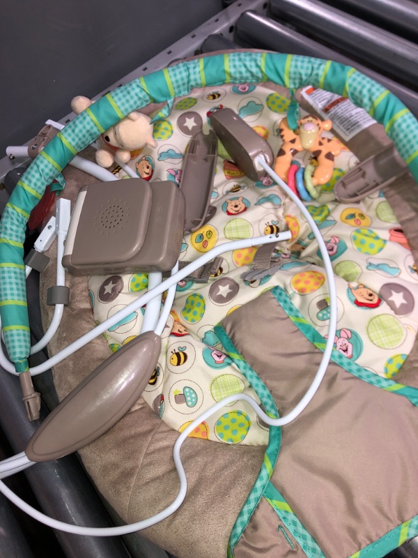 Photo 2 of Bright Starts Disney Baby Winnie the Pooh Dots & Hunny Pots Vibrating Baby Bouncer
