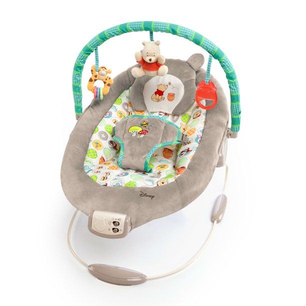 Photo 1 of Bright Starts Disney Baby Winnie the Pooh Dots & Hunny Pots Vibrating Baby Bouncer
