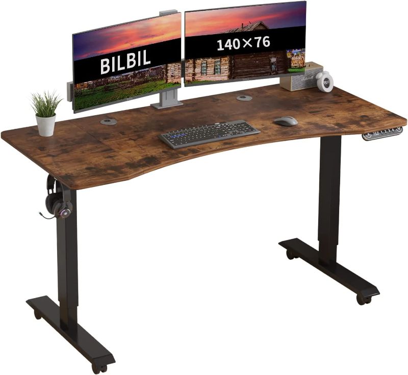 Photo 1 of BilBil Electric Standing Desk 55 x 30 Inches, Height Adjustable Sit Stand Desk with Splice Board, Casters with Brake, Black Frame/Rustic Brown Top
