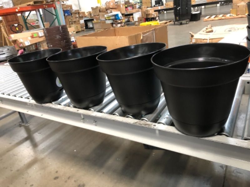 Photo 2 of (4 planters)
Southern Patio
Graff 11.9 in. x 10.7 in. Black Resin Self-Watering Planter