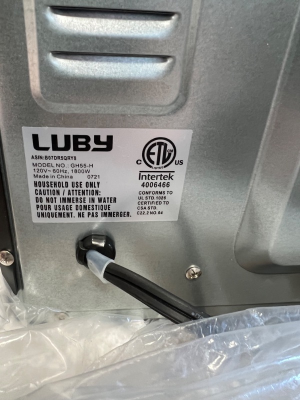 Photo 1 of LUBY Large Toaster Oven Countertop, French Door Designed, 55L, 18 Slices, 14'' pizza, 20lb Turkey, Silver
MINOR DAMAGE TO THE SIDE ITS DENTED