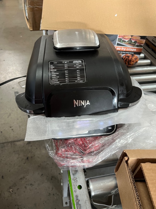 Photo 3 of Ninja AG301 Foodi 5-in-1 Indoor Grill with Air Fry, Roast, Bake & Dehydrate, Black/Silver
LEFT DIRY FROM PREVIOUS OWNER