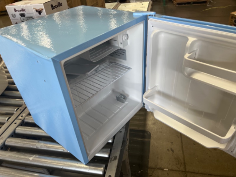 Photo 3 of ***PARTS ONLY*** Frigidaire EFR176-BLUE 1.6 cu ft Blue Retro Fridge with Side Bottle Opener.
