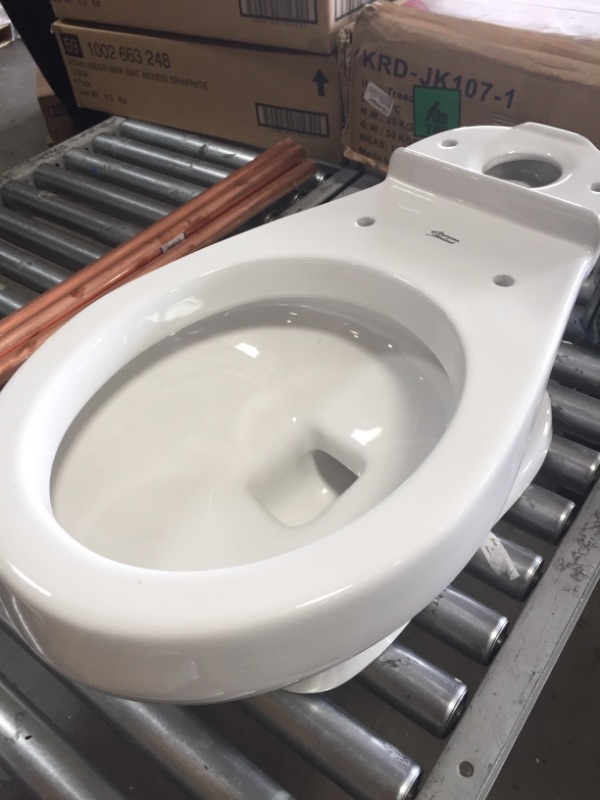 Photo 2 of AMERICAN STANDARD 3128.001.020 1.28 Gpf, Floor Mount, Round, Toilet, White
