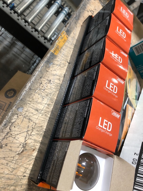 Photo 2 of 
Feit Electric
25-Watt Equivalent A19 Medium E26 Base Dimmable Filament Orange Colored LED Clear Glass Light Bulb (6-Pack)