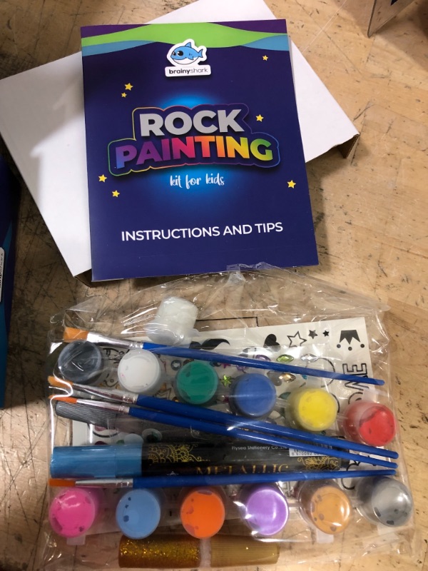 Photo 3 of Brainy Shark Rock Painting Kit for Kids - 8 Rocks, 12 Paints, 4 Brushes, Googly Eyes, Metallic Paint Pen, Glitter Glue, Tattoo & Gem Stickers