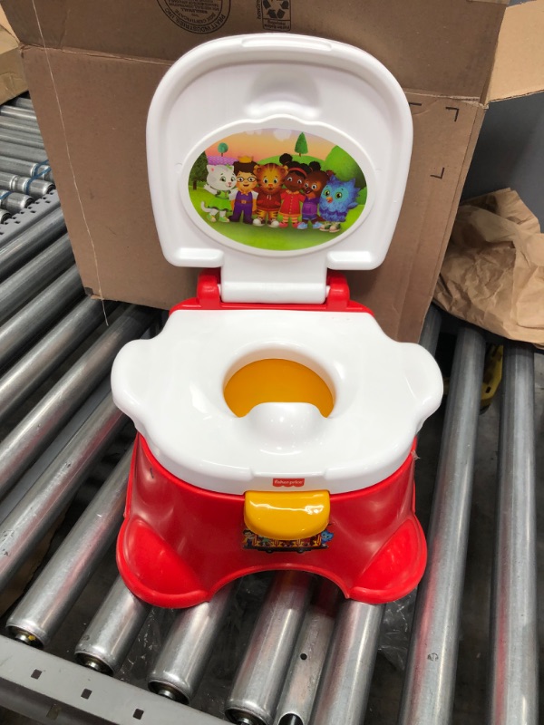 Photo 2 of Fisher-Price Daniel Tiger's Neighborhood Potty - Daniel Tiger & Friends Themed Convertible Toddler Training Toilet with Potty Ring & Stepstool
