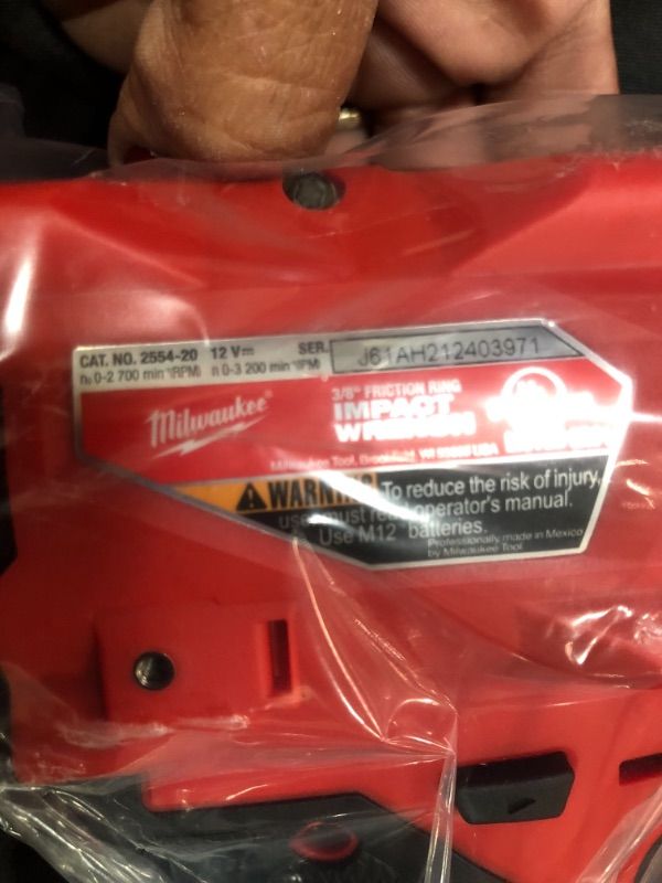 Photo 3 of "Milwaukee M12 2554-22 M12 FUEL 12V 3/8-Inch Cordless Stubby Impact Wrench Kit"
