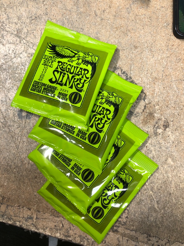 Photo 2 of 4 PCS BUNDLE
Ernie Ball Regular Slinky Nickel Wound Electric Guitar Strings, 10-46 Gauge (P02221)
