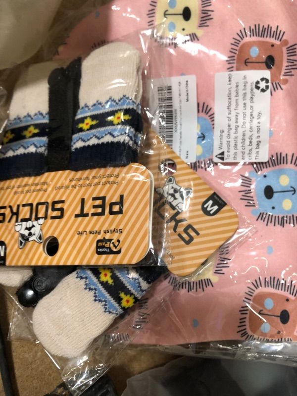 Photo 1 of **NON-REFUNDABLE**SMALL DOG SWEATER /2 SETS OF DOG SOCKS