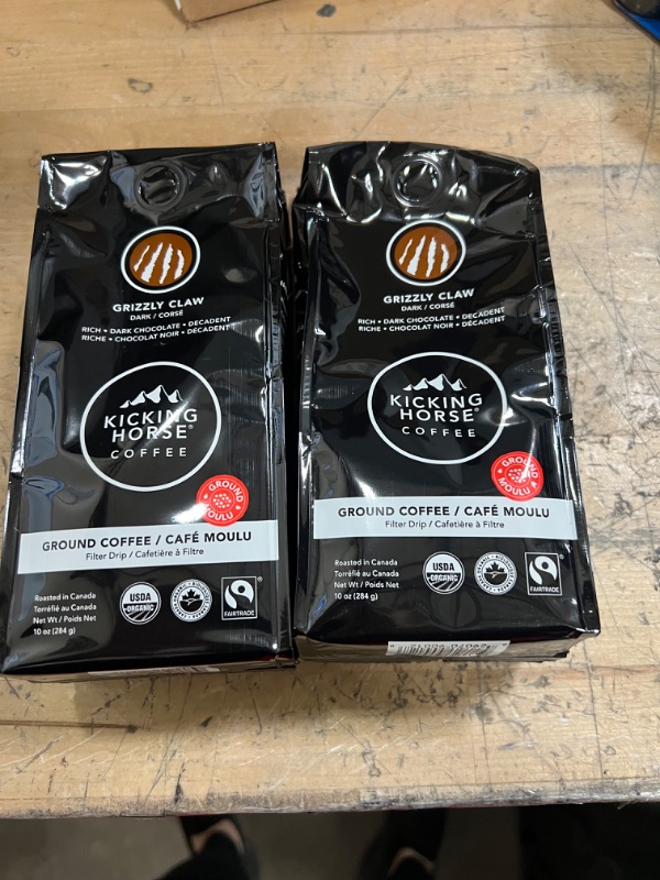 Photo 2 of **NONREFUNDABLE** 2PCKS OF Kicking Horse Coffee Grizzly Claw Dark Ground Coffee, 10 oz
BEST BY MAY 11, 2022