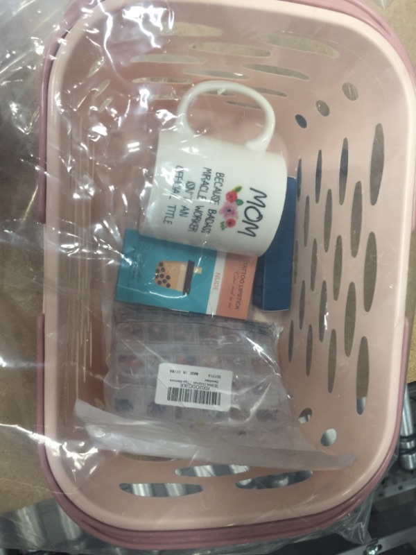 Photo 1 of ** WOMAN'S MISC BUNDLE*** ***SOLD AS IS** NO RETURNS** NO REFUNDS*** (MAKEUP, NAIL ART, SHOWER BASKET, COFFEE CUP)