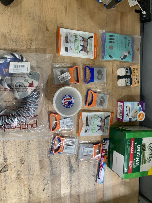 Photo 1 of **NON-REFUNDABLE EXP: 12/10/22, 7/14/22, 3/25/23 ;  Assorted Home and Pet Items, Dog and Cat Toys, Treats, Socks, and Grooming Supplies 