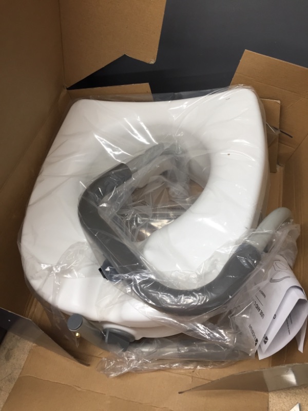 Photo 1 of E-Z Lock Raised Toilet Seat With Adjustable Armrests, 5 in.