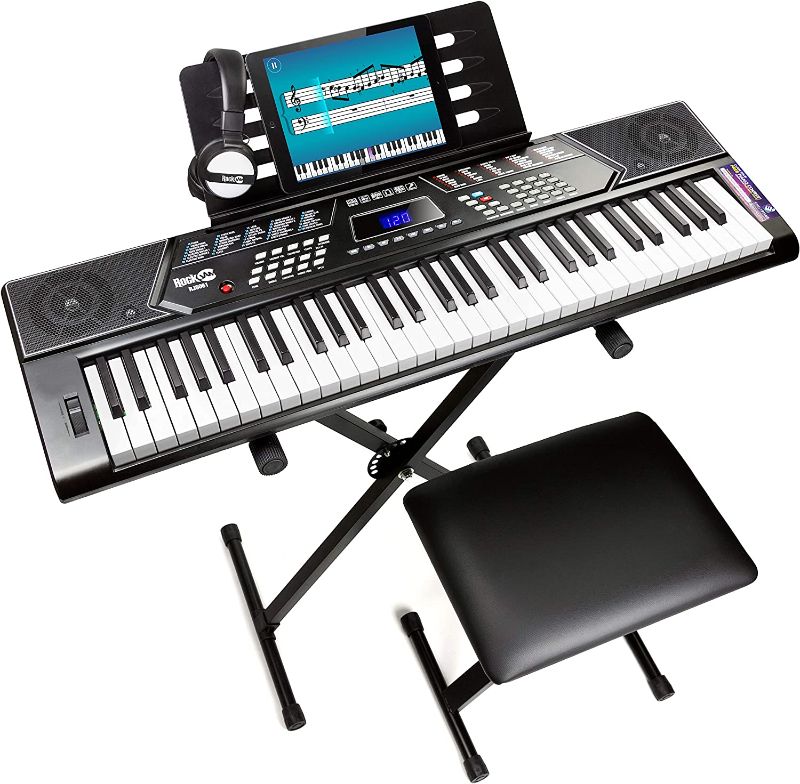 Photo 1 of RockJam 61 Key Keyboard Piano With Pitch Bend Kit, Keyboard Stand, Piano Bench, Headphones, Simply Piano App & Keynote Stickers

**TESTED, POWERS ON
