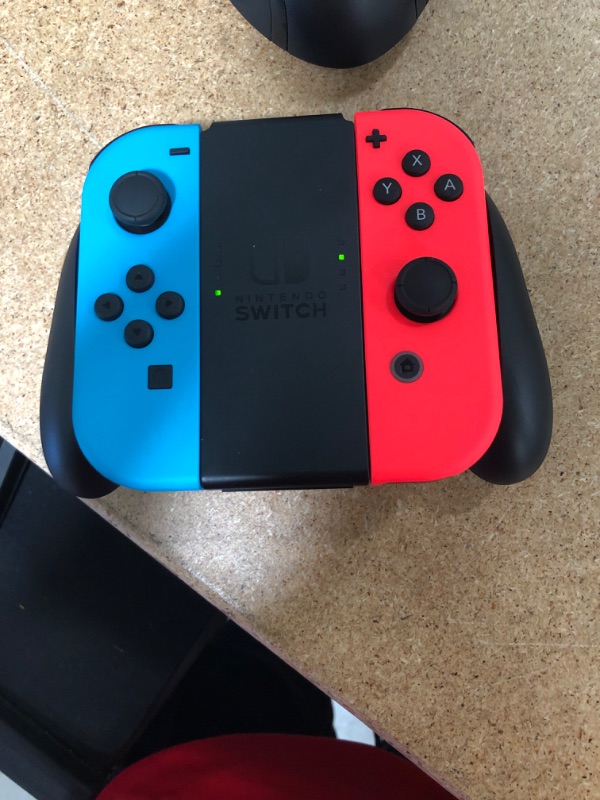 Photo 11 of Nintendo Switch with Neon Blue and Neon Red Joy?Con
