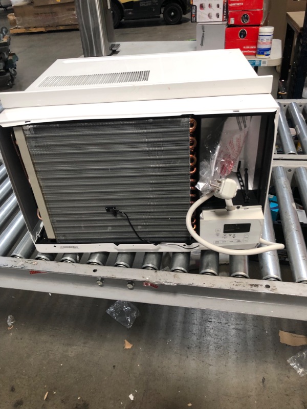 Photo 3 of LG 12,000 BTU Window Air Conditioner w/ Heat
**USED** **MAJOR DAMAGE** **MISSING PARTS**